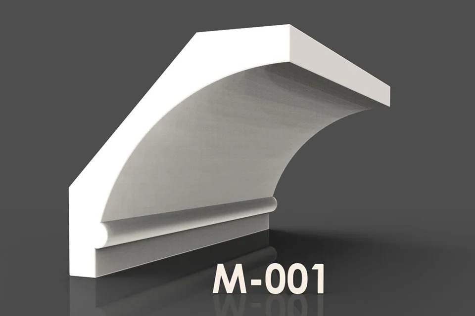 Illustration de M-001 montrant une face courbe et un bord inférieur à gradins.